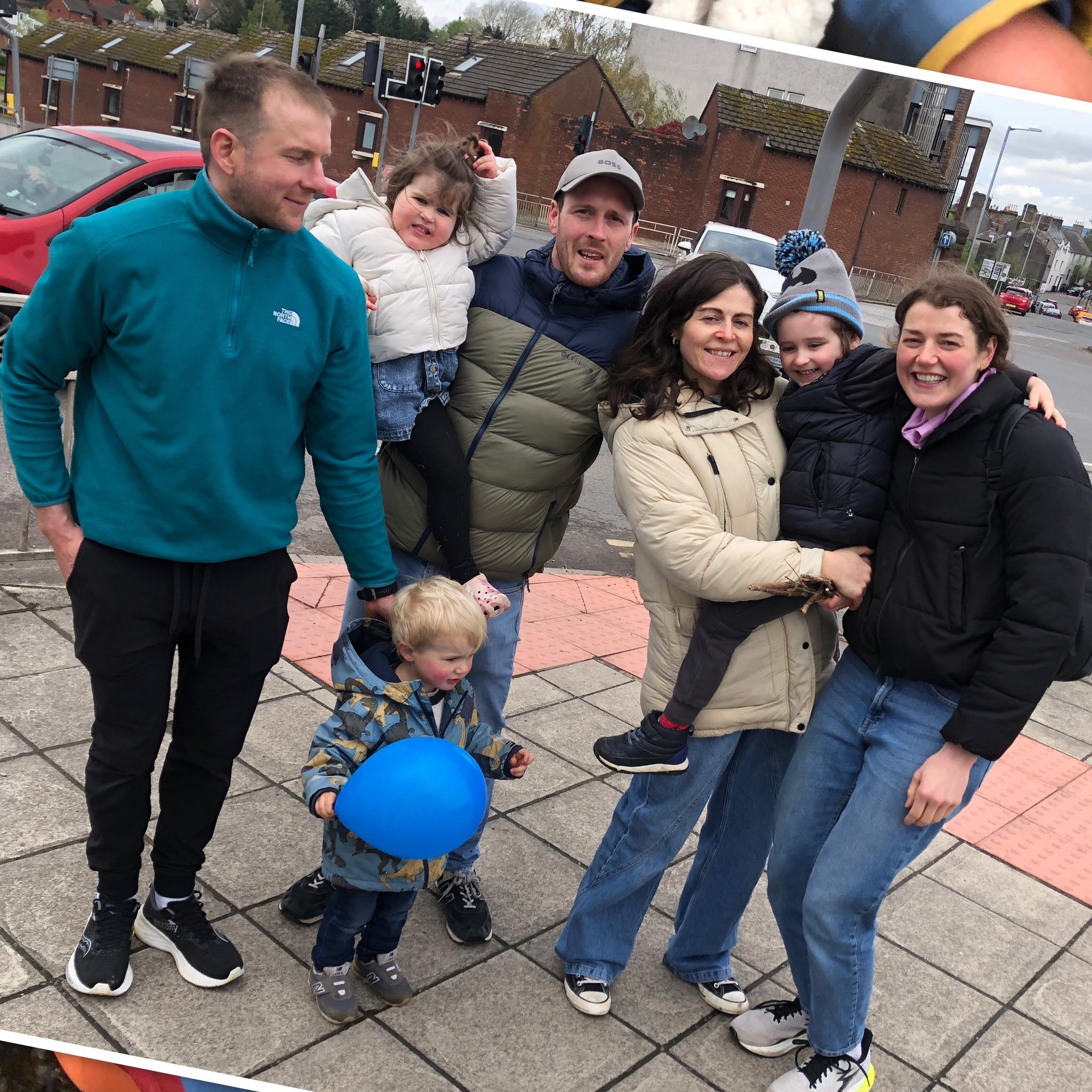 Two people studying the Bible together in a warm, comfortable setting
